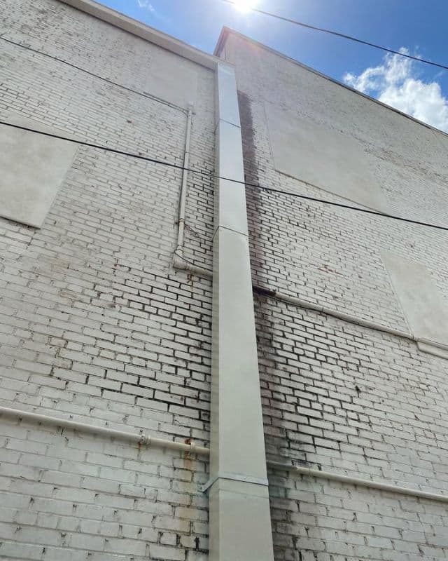 Commercial Gutter Installation in Downtown Conroe shown in dcGutterPRO project photo 1